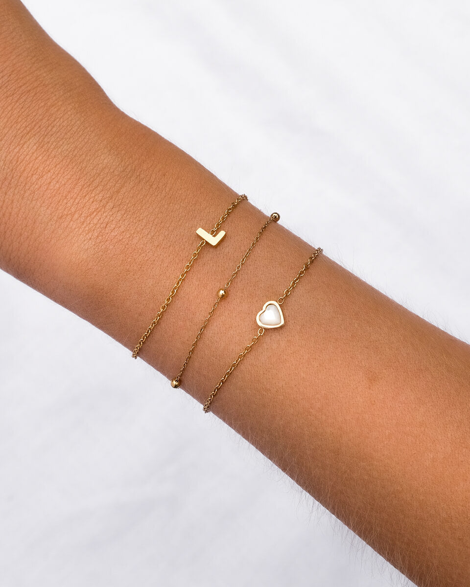 Fully popular customizable stack of 5 name/alphabet bracelets in gold